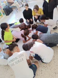 Alumnado de Educación Social de la Universidad de Málaga con menores de Palma Palmilla